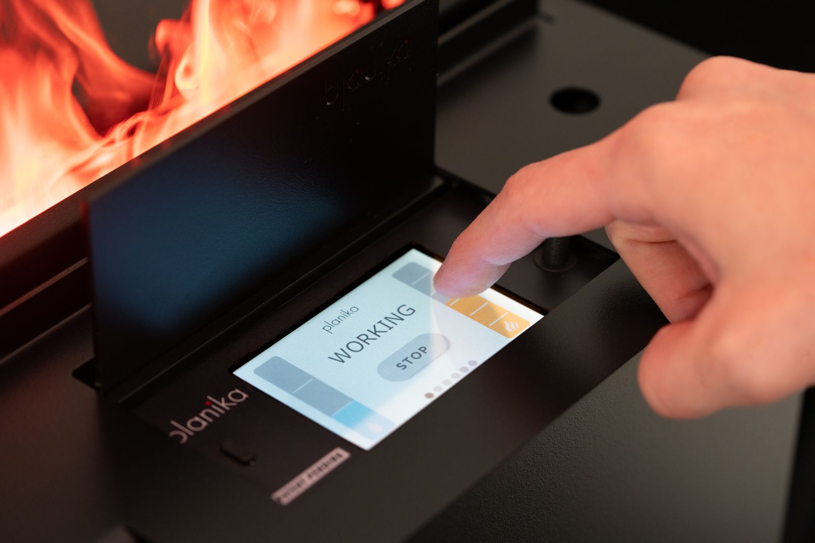 Hand using the PD Pro LCD touch screen
